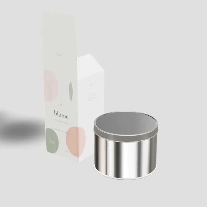 Brushed metal tin with slip lid in front of a printed carton, rendered in the Packgami studio